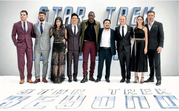  ??  ?? Director Justin Lin, fourth from right, with Star Trek Beyond stars, from left, Zachary Quinto, Karl Urban, Sofia Boutella, John Cho, Idris Elba, Simon Pegg, Lydia Wilson and Chris Pine attend the film’s London premiere this week.