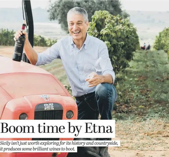  ??  ?? AT THE WHEEL: Above, Stefano Girelli is driving change and quality in Sicily; inset left, wines being harvested on the island.