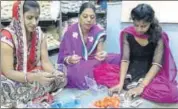  ?? HT PHOTO ?? Women make rakhis at their home in Alwar.