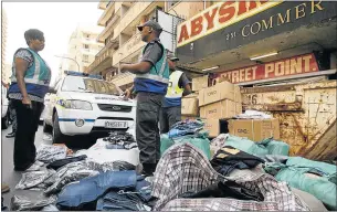  ?? Picture: FILE ?? BIG MARKET: Police with fake goods found in an illegal factory