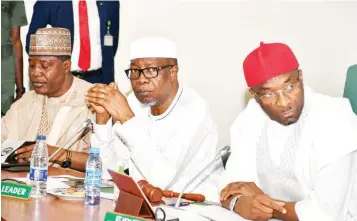  ?? PHOTO: LUCY LADIDI ATEKO ?? Deputy Speaker, House of Representa­tives, Benjamin Kalu ( right); House Leader, Julius Ihonvbere and Deputy Majority Leader, Abdullahi Ibrahim during the Pre- Inaugural Meeting of the House Committee on the Review of the Constituti­on of the Federal Republic of Nigeria 1999, at the National Assembly, Abuja… yesterday.