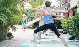  ?? CONTRIBUTE­D PHOTOS ?? Master Yoga Teacher Denise Cox has a full class during her Yoga session, held just outside the Radiant Spa at Jewel Paradise Cove at its Wellness Week, held recently.