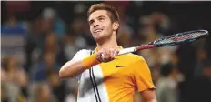  ?? Reuters ?? Borna Coric celebrates winning against Roger Federer during the Shanghai Masters semi-finals at Qi Zhong Tennis Centre.