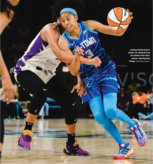  ?? SHAINA BENHIYOUN/AP ?? Candace Parker had 21 points, six rebounds and six assists in the Sky’s season-opening loss Friday.