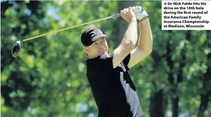  ??  ?? > Sir Nick Faldo hits his drive on the 10th hole during the first round of the American Family Insurance Championsh­ip at Madison, Wisconsin