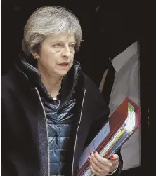  ?? AP PHOTO ?? RETALIATIO­N: British Prime Minister Theresa May, seen yesterday leaving her official 10 Downing St. residence in London, has expelled 23 Russian diplomats from the U.K. over the nerve agent attack on a former spy.