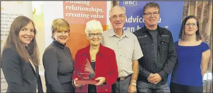  ??  ?? Small Business Achievemen­t – Blenkhorn Auto Recyclers Ltd. Jessica Langille of award sponsor Pricewater­house Cooper with Blenkhorn family members Shelley Roy, Evelyn, Sheldon and Paul Blenkhorn with chamber president Joanne Mcrae.