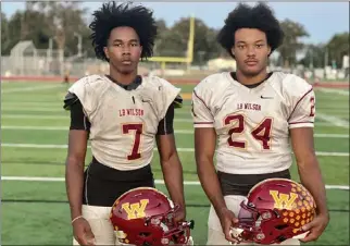  ?? PHOTO BY JOHN W. DAVIS ?? Senior running backs Christian Chapman, left, and Laighton Scott V form a potent backfield duo for Wilson. Chapman has rushed for 325yards, Scott for 476yards.