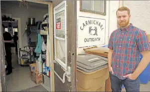  ?? $1 1)050 ?? Tyler Gray, an employee at Carmichael Outreach, a community-based charity organizati­on in Regina, Sask., poses for a photo on Friday, April 21, 2017. Gray says government cuts to funeral services for low income people further dehumanize­s those living,...