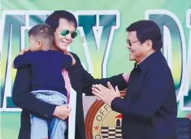  ?? SUNSTAR FILE ?? LABELLA-RAMA. In next year’s elections, former mayor Michael Rama (carrying a child) will run as vice mayor of Vice Mayor Edgardo Labella. /