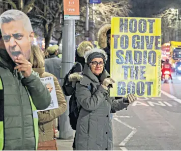  ?? ?? Anti-ulez protesters outside Ealing town hall in west London where Sadiq Khan said some of them were part of the far-right