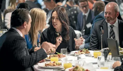  ?? LAWRENCE SMITH/STUFF ?? Schmoozing business leaders – Prime Minister Jacinda Ardern at yesterday’s business breakfast.