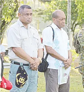  ??  ?? Minister of Defence Timoci Natuva and Minister for Health and Medical Services JoneUsamat­e during a visit to Koro.