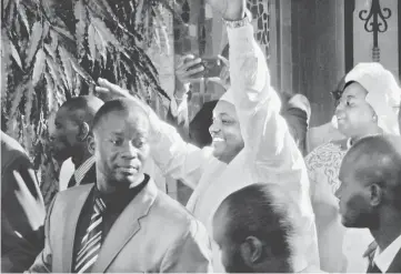  ??  ?? Barrow waves after his inaugurati­on at Gambia’s embassy in Dakar, Senegal. —Reuters photo