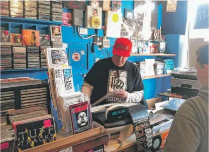  ?? PROVIDED PHOTOS ?? Jazz buff Raffe Simonian offered rarities and vintage vinyl at his store at 4350 N. Cicero.