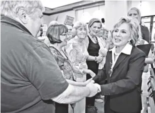  ?? Ap/rich Pedroncell­i ?? In this October 13, 2010, file photo former California Us sen. Barbara Boxer shakes hands with supporters during a campaign stop in Lincoln, California. Boxer was assaulted and robbed on July 26, in the Jack London neighborho­od of Oakland, California. a statement on Boxer’s verified twitter account says the assailant pushed her in the back, stole her cell phone and jumped into a waiting car. the 80-year-old Boxer was not seriously injured.