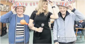  ??  ?? Jean Rimmer, 87 and Ruth Holme 85, join the fun with Sophie Bennett