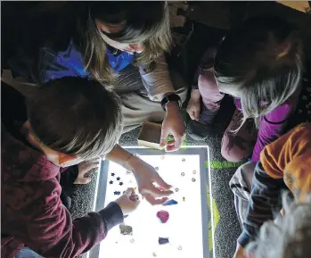  ?? PHOTOS: CHUCK BURTON/THE ASSOCIATED PRESS ?? Safe spaces, quiet times and breathing exercises can help young children in difficult circumstan­ces better cope with stress so they can learn.