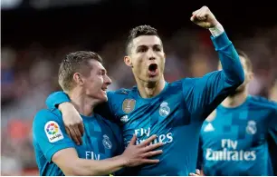  ?? AP ?? Cristiano Ronaldo (right) and Toni Kroos celebrate a goal against Valencia on Saturday. —