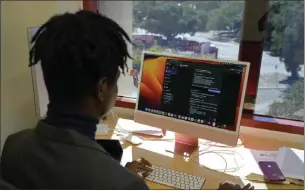  ?? ?? Omiye looks over chatbots in his office at the Stanford School of Medicine in Stanford on Tuesday.