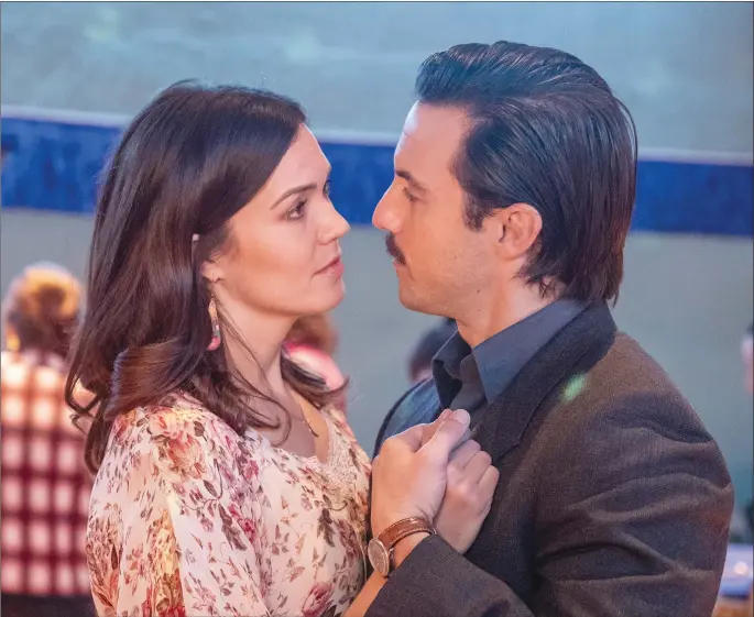  ??  ?? Mandy Moore and Milo Ventimigli­a in a scene from “This Is Us”