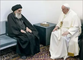  ?? Vatican Media via AP ?? Pope Francis meets with Iraq’s leading Shiite cleric, Grand Ayatollah Ali al-Sistani, on Saturday in Najaf, Iraq. Ayatollah al-Sistani is a deeply revered figure in Shiite-majority Iraq, and his opinions on religious matters are sought by Shiites worldwide.