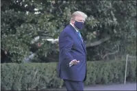  ?? ALEX BRANDON — AP PHOTO ?? President Donald Trumpwaves to members of the media as he leaves the White House for the hospital.