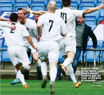  ?? PICTURES: Chris Hyslop ?? ALMOST THERE: Striker Danny Rowe’s recordbrea­king goal put Fylde on the brink of promotion