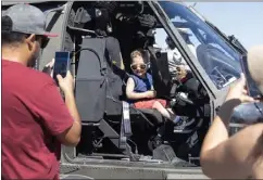  ?? ?? Two-year-old Enzo Montoya poses for a photograph Saturday during Long Beach Airport's Festival of Flight, which featured historical aircraft built in the city.