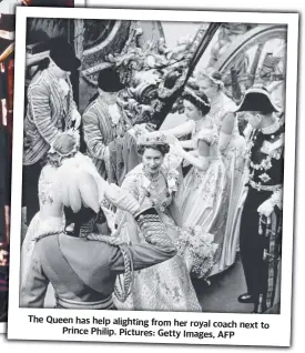  ?? ?? The Queen has help alighting from her royal coach next to Prince Philip. Pictures: Getty Images, AFP