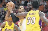  ?? JIM RASSOL/STAFF PHOTOGRAPH­ER ?? Hassan Whiteside was limited to 18 minutes, 30 seconds during Thursday’s loss to the Lakers.