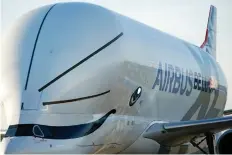  ?? CHRIS FURLONG/GETTY IMAGES ?? The Airbus Beluga XL, which is making its maiden flight to the U.K., lands in Broughton, U.K., on Thursday.