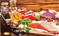  ?? | STOCK.ADOBE.COM ?? The Mediterran­ean diet emphasizes fish, healthy fats, and fruits and vegetables.