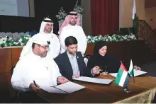  ??  ?? From left: Mohammad Shael Al Sa’adi, Dr Faisal Ekram and Laila Al Jasmi sign the Memorandum of Understand­ing while Dr Omar Al Muthanna and Saleh Ali Al Mazmi look on.