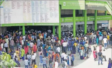  ?? YOGENDRA KUMAR/HT PHOTO ?? Passengers wait outside HUDA City Centre Metro station. Metro authoritie­s said they were forced to shut down the entry gates at Huda City Centre and Iffco Chowk stations after Sunday morning’s snag.
