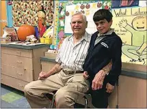  ?? PHOTO COURTESY OF THE THOMSON FAMILY ?? Buttonwill­ow-area farmer Jack Thomson sits with his greatgrand­son Joaquin DeRose during a Veterans Day celebratio­n at Downtown School.