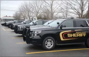  ?? ?? Madison County Sheriff’s vehicles.