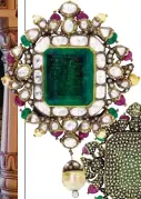  ??  ?? Emerald brooch with an intricatel­y-rendered back, and diamond and pearl choker, The Gem Palace. All prices upon request.