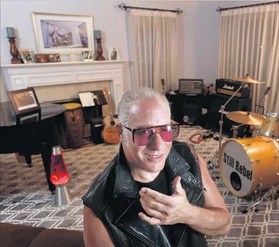  ?? Rick Loomis Los Angeles Times ?? “IF MY BOYS aren’t here, I’m not in this room,” the actor says of the musical hangout in his house in Sherman Oaks.