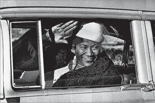  ?? ANDREW PAVLIN/CHICAGO TRIBUNE ?? Mahalia Jackson enjoys a drive in Chicago, circa 1954. The New Orleans native moved to Chicago at age 16 and eventually bought a spacious ranch home in the Chatham neighborho­od.
