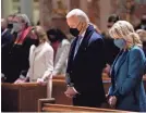  ?? EVAN VUCCI/AP ?? The Bidens attend Mass during Inaugurati­on Day ceremonies in Washington, D.C.