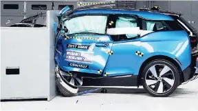  ??  ?? This October 4, 2016 photo, provided by the Insurance Institute for Highway Safety, shows a 2017 BMW i3 during crash safety testing.