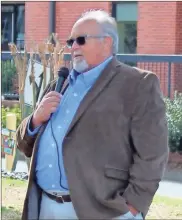  ?? Jeremy Stewart ?? Polk County Commission­er and former Rockmart councilman Ray Carter speaks during the ceremony commemorat­ing the city’s municipal complex for Jeff Ellis.