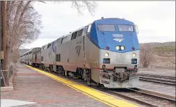  ??  ?? The Southwest Chief, which runs from Chicago to Los Angeles, pulls into a station in Lamy, N.M.