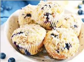  ?? ?? MOIST BLUEBERRy STREUSEL MUFfiNS wITH A HINT OF ORANGE AND MELT IN yOUR mouth streusel topping.