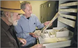  ?? Allen J. Schaben Los Angeles Times ?? MAKING A LIVING IN THE DIRT Cerutti with Tom Deméré, paleontolo­gy curator at the San Diego Natural History Museum, who called him “the most generous person I have ever known.”