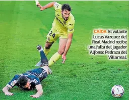  ??  ?? CAÍDA. El volante Lucas Vázquez del Real Madrid recibe una falta del jugador Alfonso Pedraza del Villarreal.