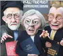  ??  ?? THREE OF A KIND:
Three actors, portraying Jeremy Corbyn, Theresa May and Tim Farron, at an election themed attraction called Poll-tergeistat in Surrey.