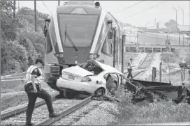  ?? TRANSPORTA­TION SAFETY: A man was killed and two children hurt in April in a crash involving a Metrorail train in North Austin. ralph barrera / ameriCan-statesman ??