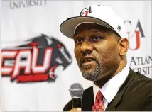  ?? CURTIS COMPTON/CCOMPTON@AJC.COM ?? George Lynch was named the new men’s head basketball coach at Clark Atlanta on Monday. The ex-NBA player holds the University of North Carolina career steals record.